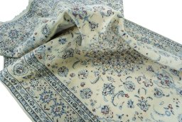 Surface texture of New Nain rug with natural Wool and intricate pattern