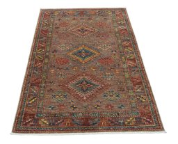 Surface texture of New Kazak rug with natural Wool and intricate pattern