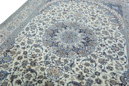 Backside of handmade 2000s Nain rug showing knot structure and weave density