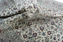 Surface texture of 2000s Kashan rug with natural Wool and intricate pattern
