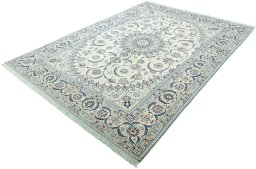 Corner detail of 2000s Nain rug showing border pattern and Wool pile
