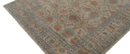 Backside of handmade New Farahan rug showing knot structure and weave density