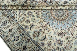 Close-up detail of 2000s Nain rug from Iran / Persia showing Wool weave