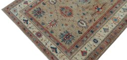 Backside of handmade New Kazak rug showing knot structure and weave density