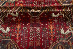 Corner detail of 2000s Shiraz rug showing border pattern and Wool pile
