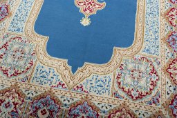 Close-up detail of 2000s Kerman rug from Iran / Persia showing Wool weave