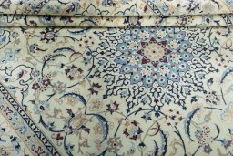 Close-up detail of 2000s Nain rug from Iran / Persia showing Wool weave