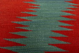 Backside of handmade New Kilim Sofre rug showing knot structure and weave density