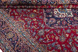 Close-up detail of 2000s Kashan rug from Iran / Persia showing Wool weave