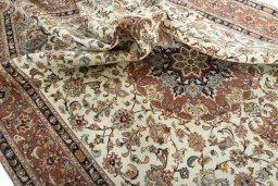 Surface texture of 2000s Tabriz 50/60/70 Raj rug with natural Cork and intricate pattern