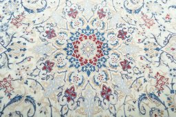 Central medallion detail of 2000s Nain rug from Iran / Persia